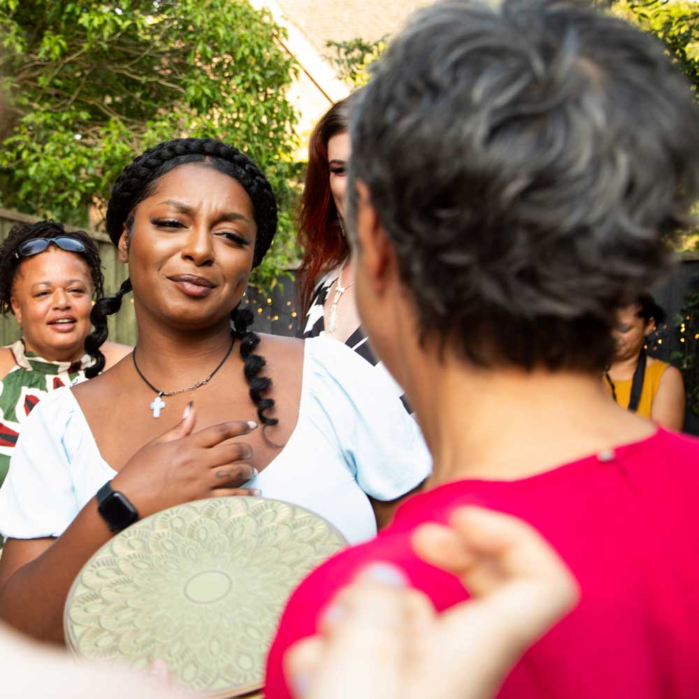 friends-and-family-arriving-at-a-summer-garden-par-2025-04-04-05-56-07-utc